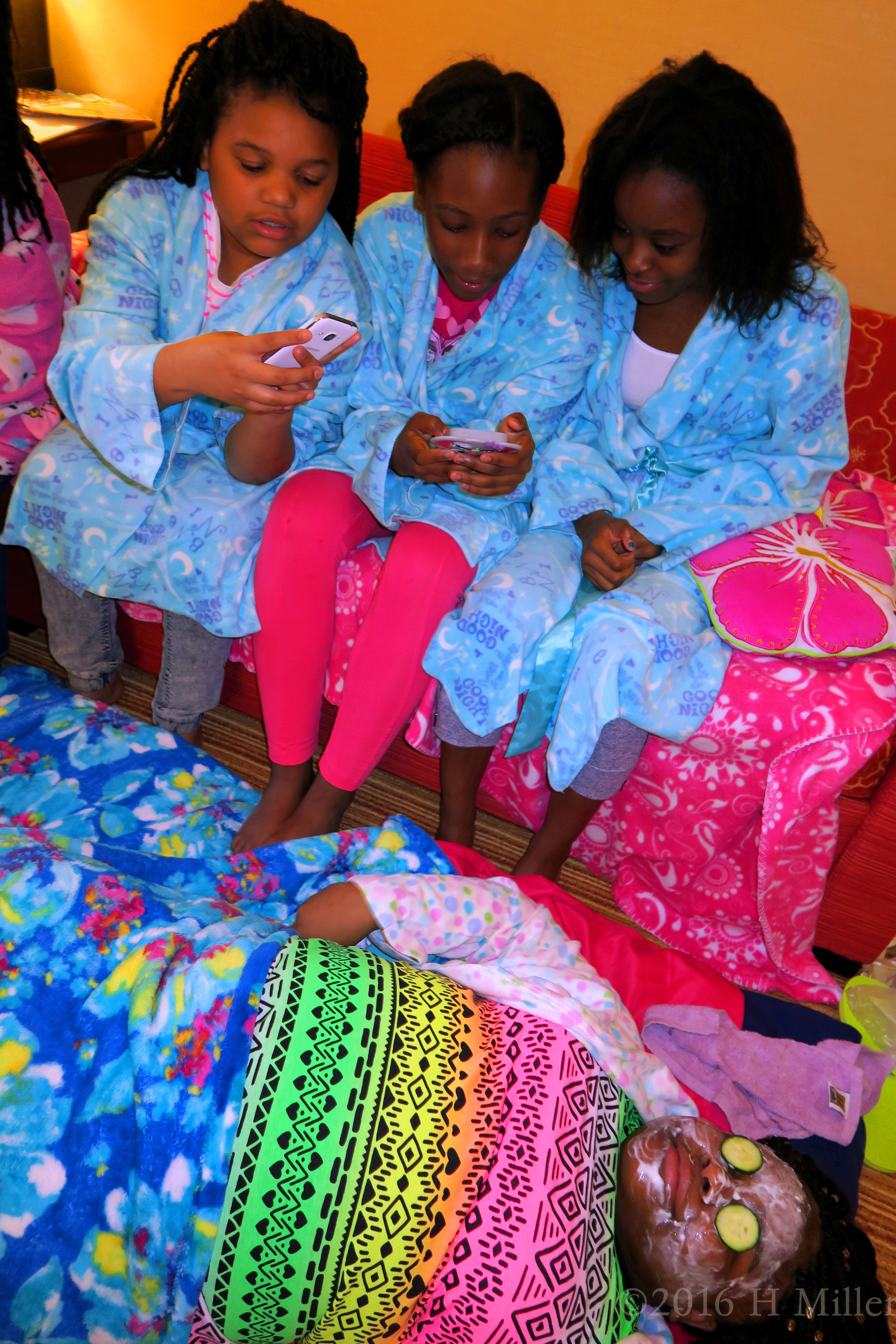 The Girls Taking Pics Of Chanell While She Has A Facial Masque And Cucumber Slices on Her Eyes. The Girls Taking Pics Of Chanell While She Has A Facial Masque And Cucumber Slices on Her Eyes.