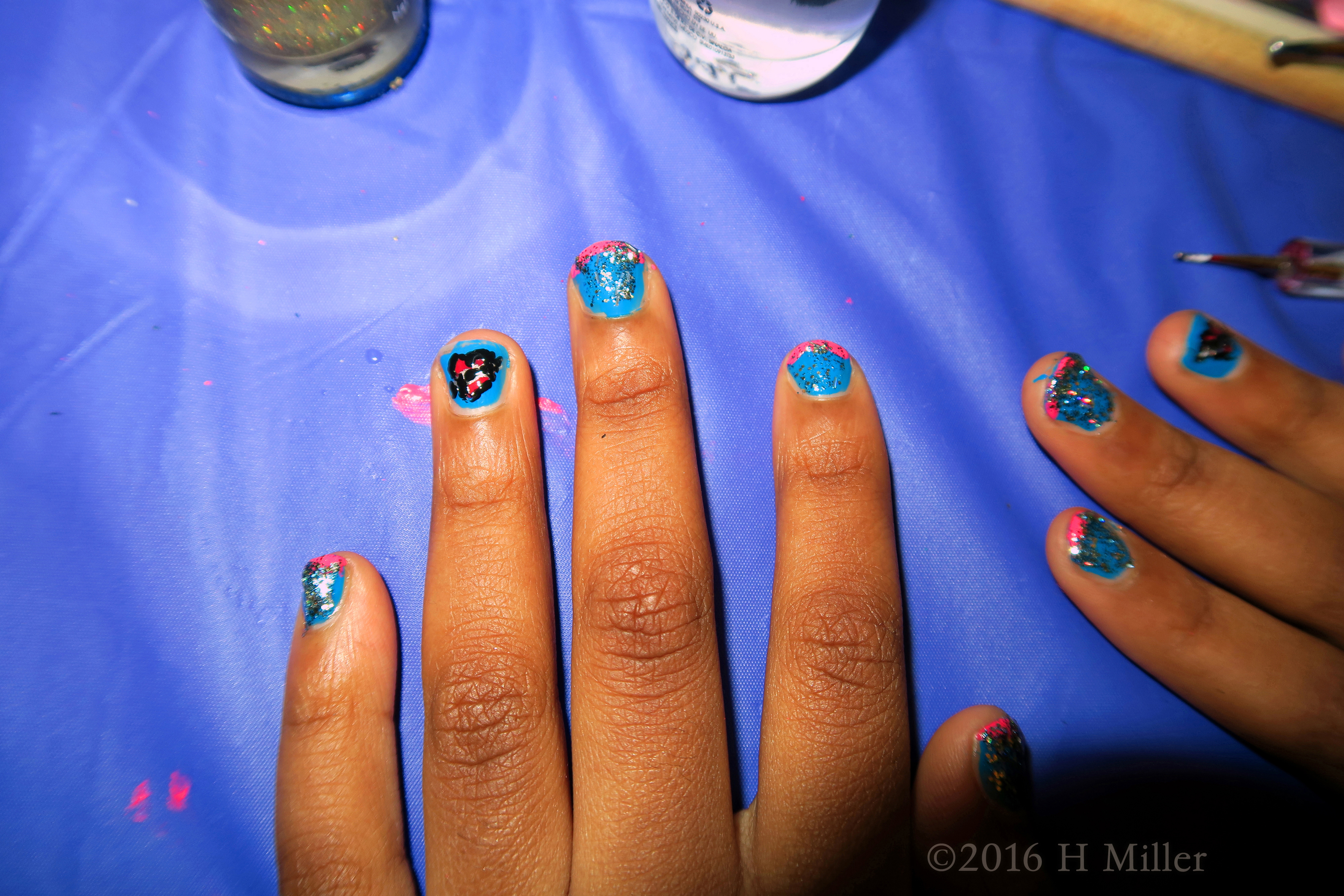 Unique French Nails With Blue And Pink Trim And Heart Graphic. Unique French Nails With Blue And Pink Trim And Heart Graphic.