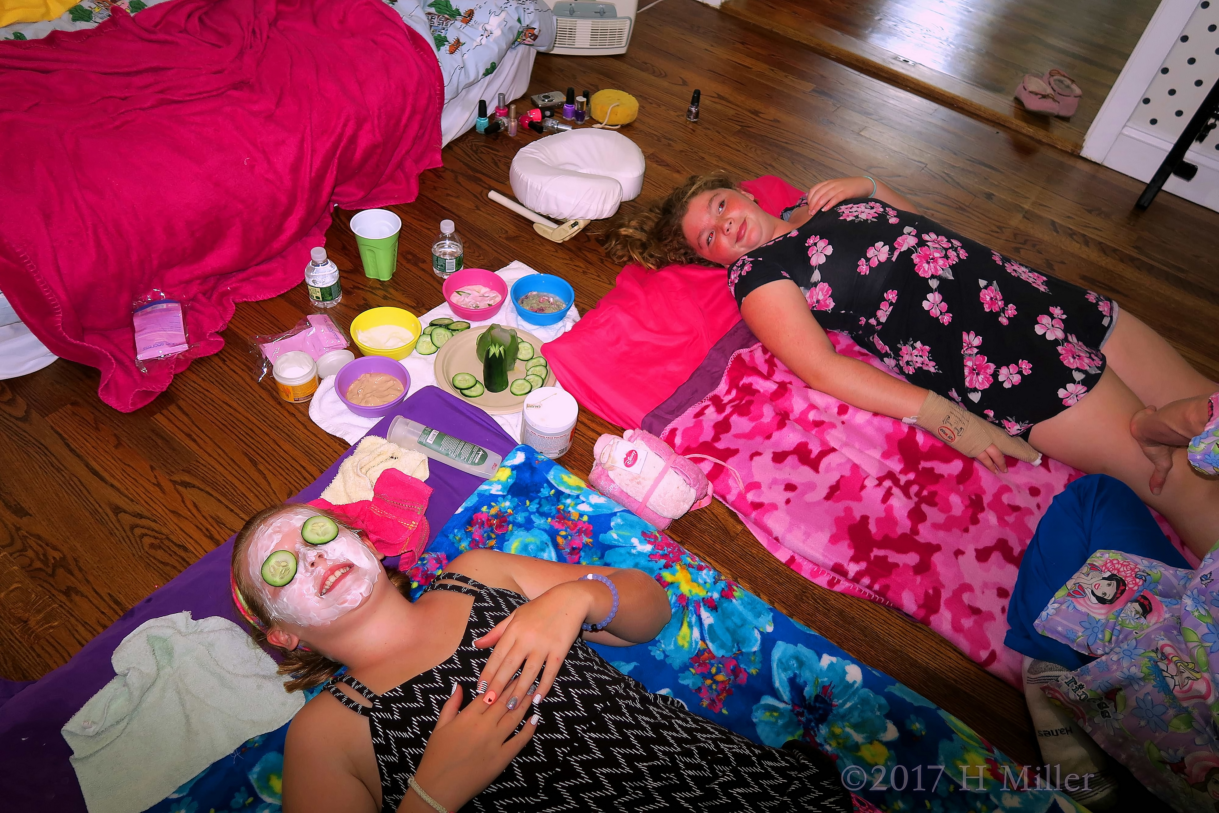 Two Girls Getting Their Kids Facials Done Two Girls Getting Their Kids Facials Done