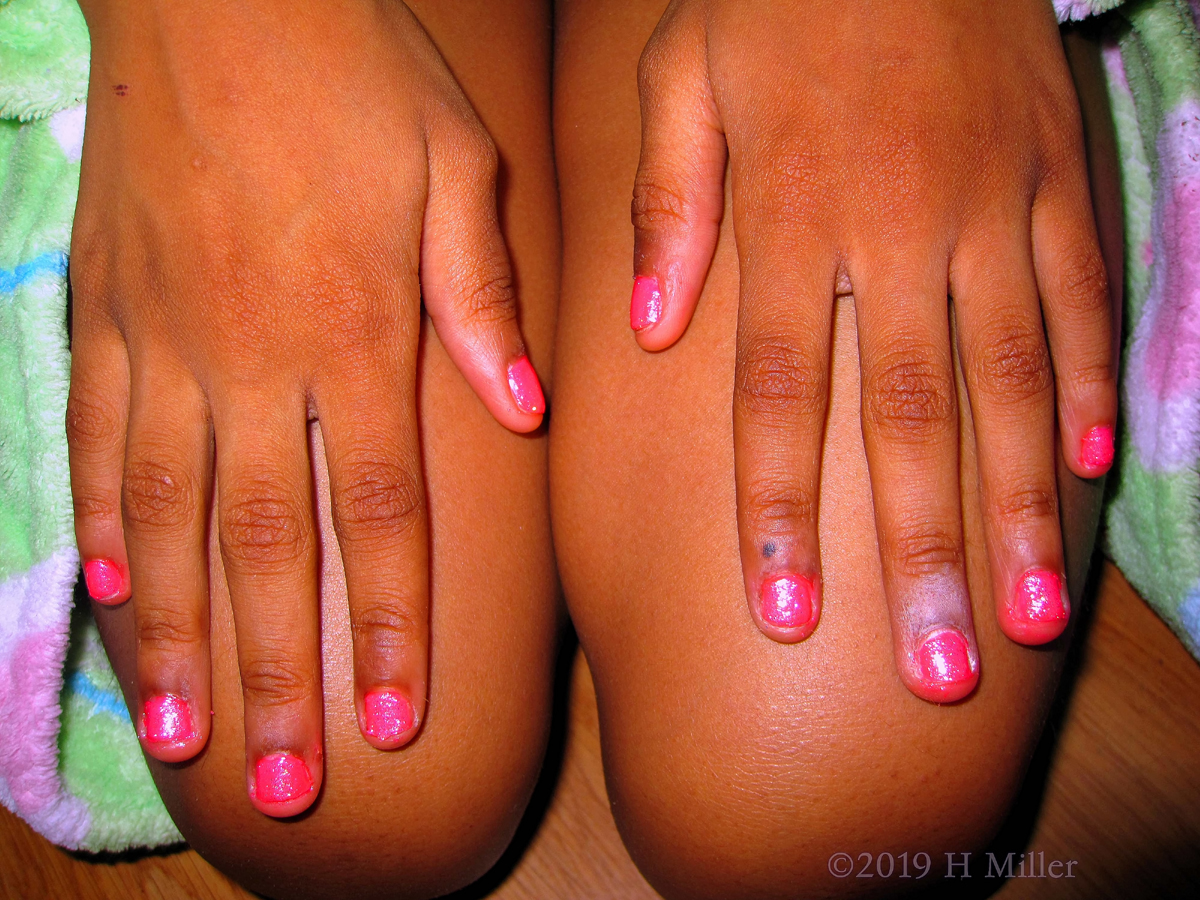 Pink Manicure For Girls With Sparkles And A Pink Base