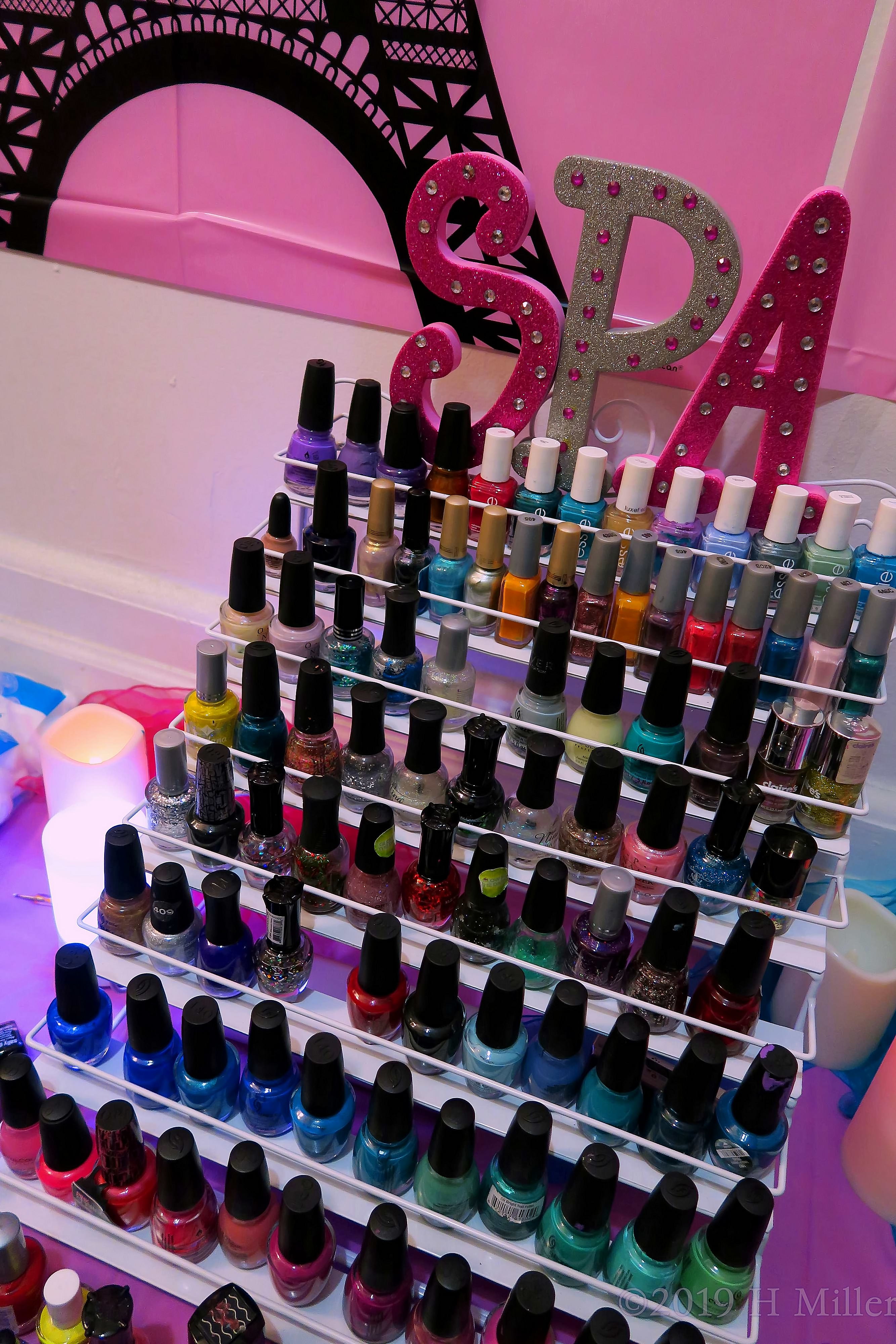 Arranged Nail Polish With Candles To The Side At The Nail Spa Station Arranged Nail Polish With Candles To The Side At The Nail Spa Station