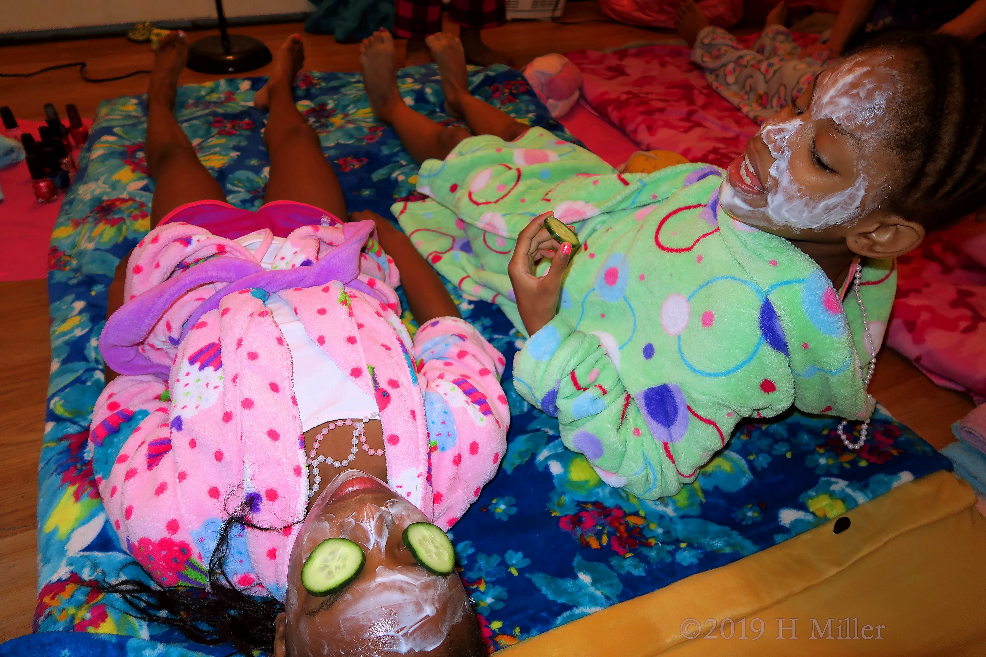 Two Spa Girls Talking While Getting Girls Facials Two Spa Girls Talking While Getting Girls Facials