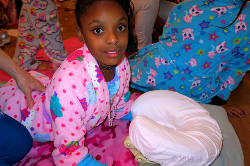 Bunny Spa Robe Guest On Blue Flowered Spa Mat, During Her Kids Massage