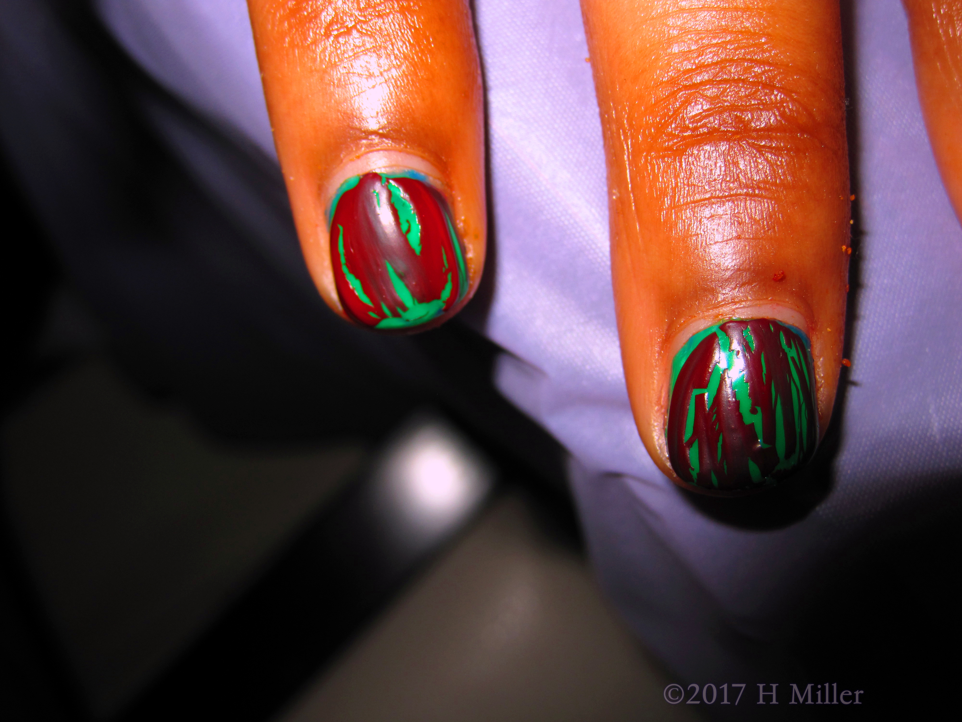 Green Base With Maroon Shatter Nail Polish, This Girls Manicure Looks Great! 