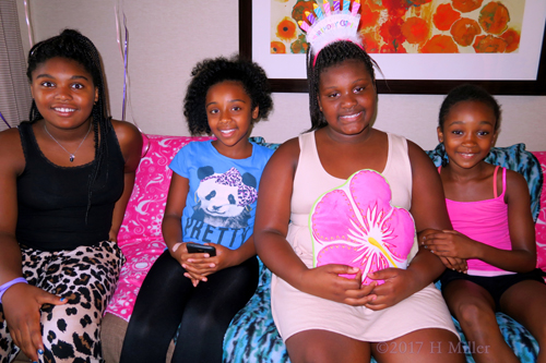 Cynaya's Sitting With Holding The Pink Kids Spa Pillow!