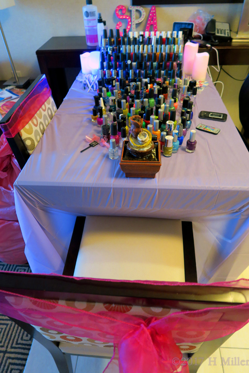 Display Of Nail Polishes Perfectly Arranged For The Girls Manicures.