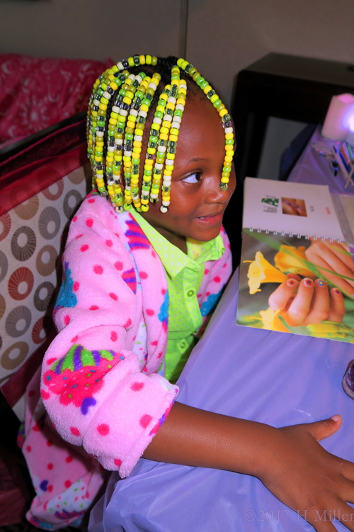 Enjoying Her Kids Manicure Activity.