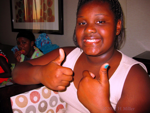 Happiness Expressed With A Thumbs Up During The Spa For Girls!