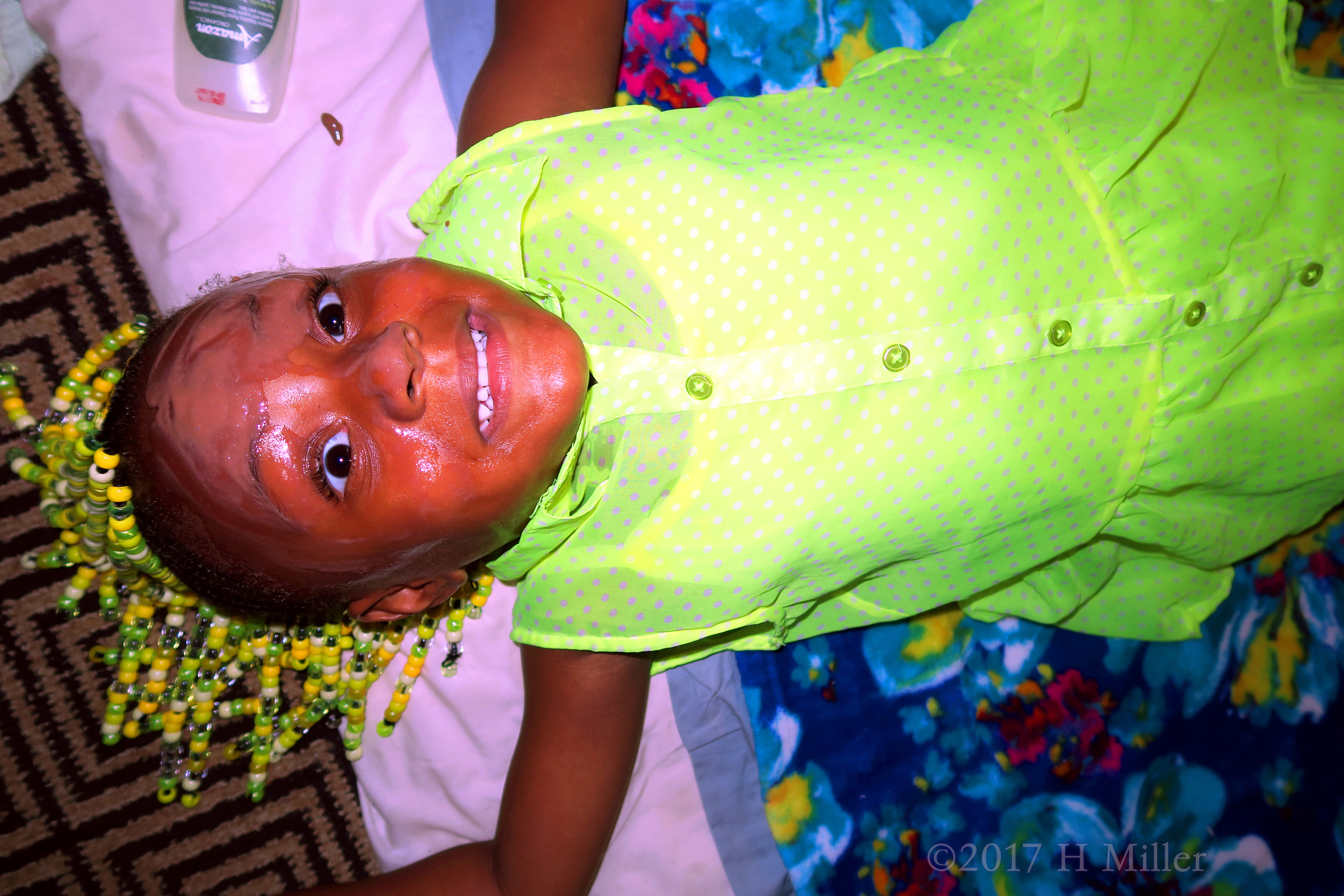 Smiling Big As She Enjoys The Girls Facial Activity At The Spa Party. Smiling Big As She Enjoys The Girls Facial Activity At The Spa Party.