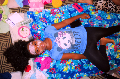 She Smiles And Enjoys Her Girls Spa Facial Treatment. She Smiles And Enjoys Her Girls Spa Facial Treatment.