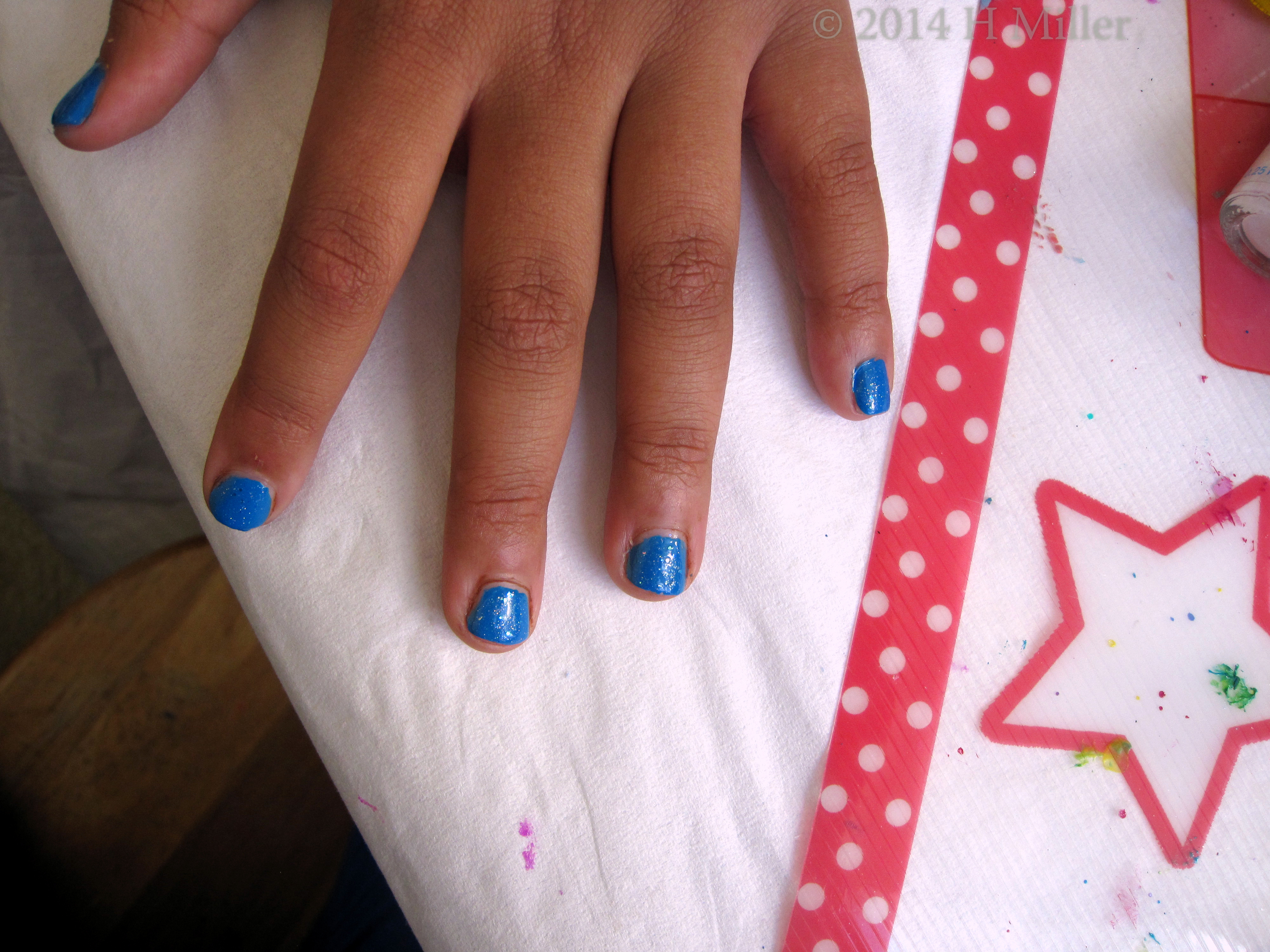 Electric Blue Plish With Rainbow Glitter. Electric Blue Plish With Rainbow Glitter.