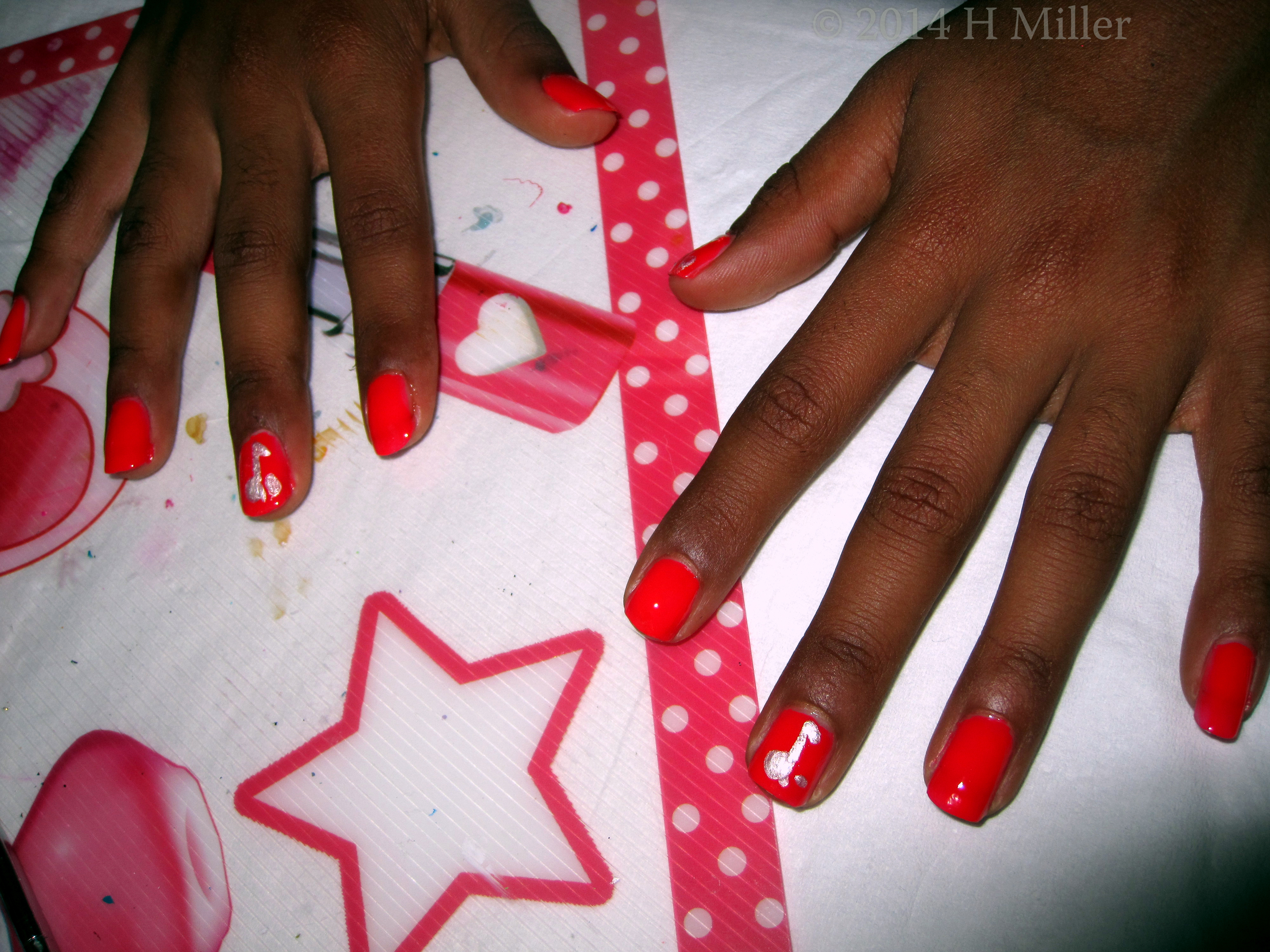 Orange Nails With Silver Dotted Eigth Note. Orange Nails With Silver Dotted Eigth Note.