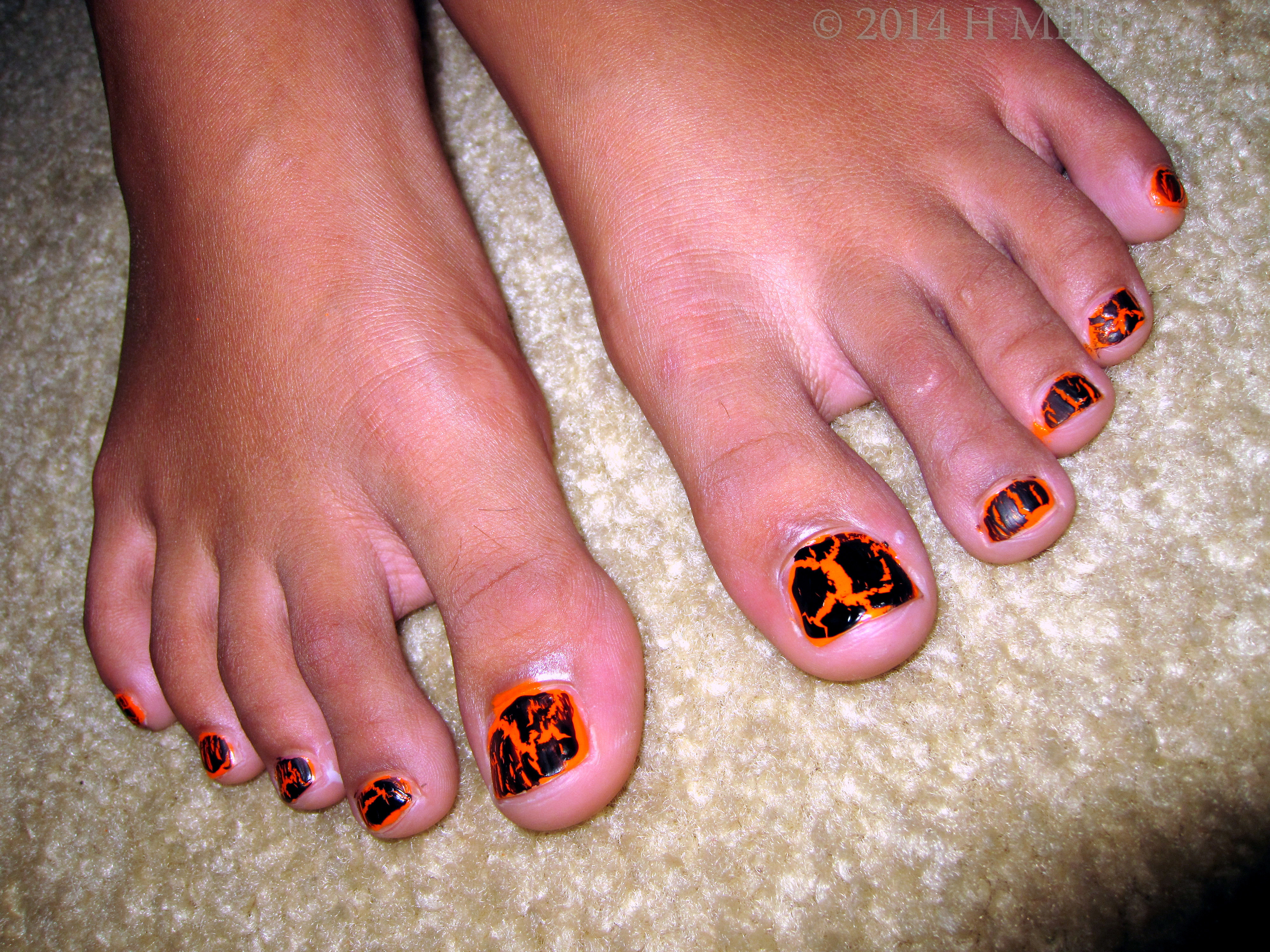 Halloween Pedi Orange Nail Polish Covered With Bloack OPI Shatter. Halloween Pedi Orange Nail Polish Covered With Bloack OPI Shatter.