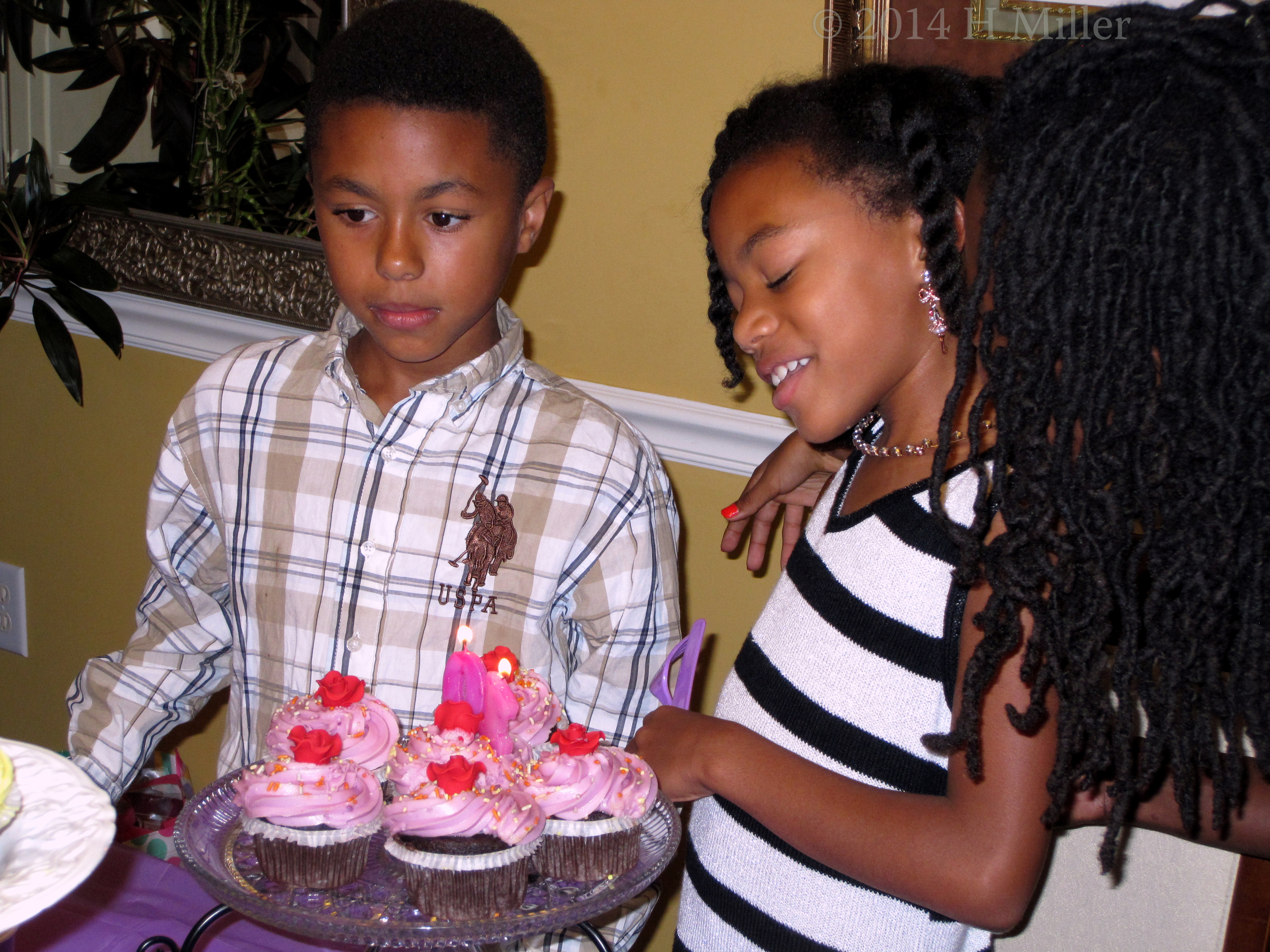 The Twins Blowing Out The Candles Together. 