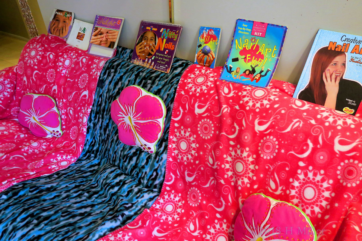 Spa Party Couch With Nail Art Books For The Kids To Explore. 