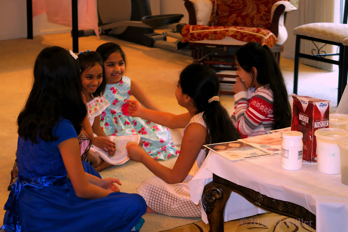 The Girls Chit Chatting And Having Fun At The Kids Spa Party. 