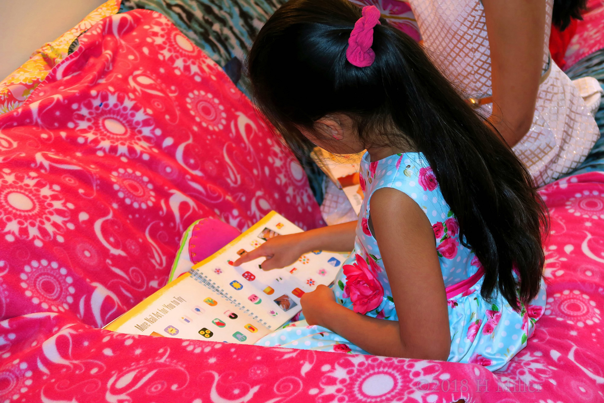 While Choosing The Nail Art Design For Her Mini Mani, She Points To Her Favorite! 