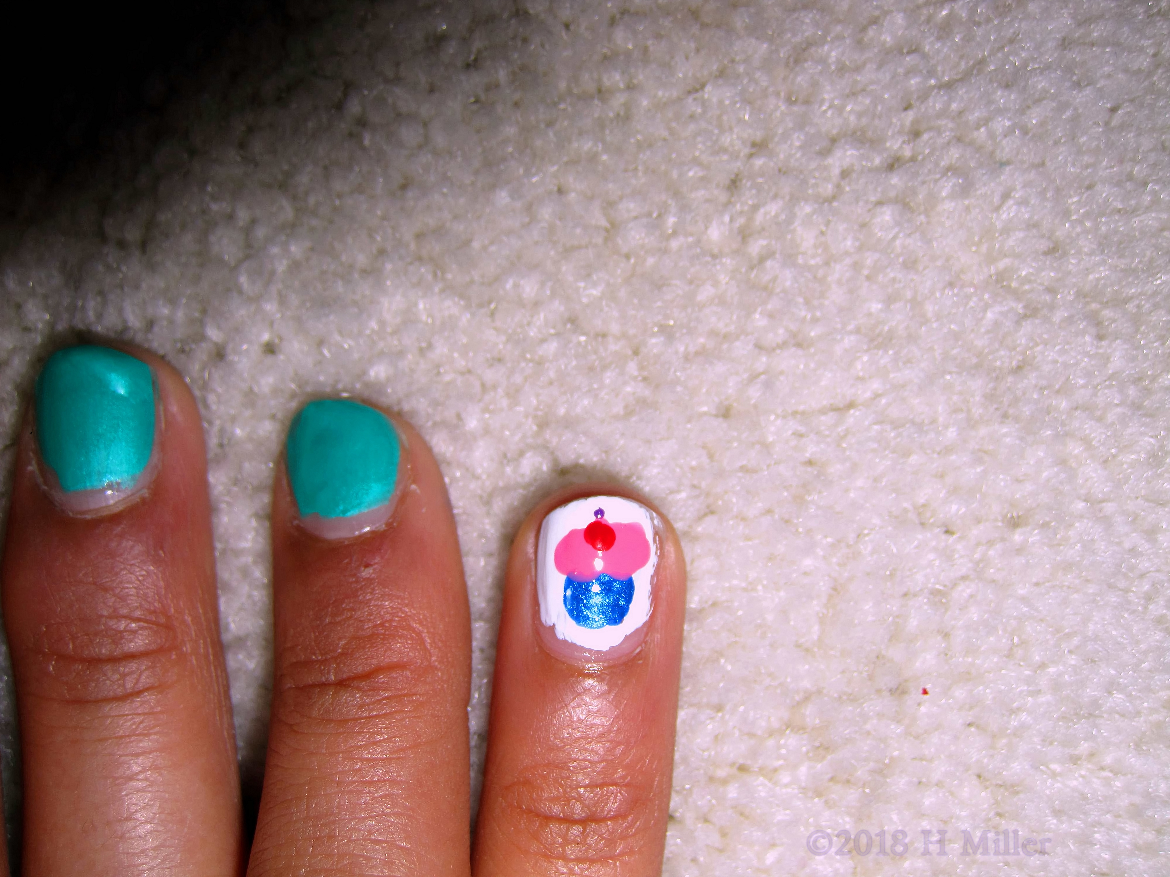 A Closeup Of The Cupcake Nail Design For Kids! 