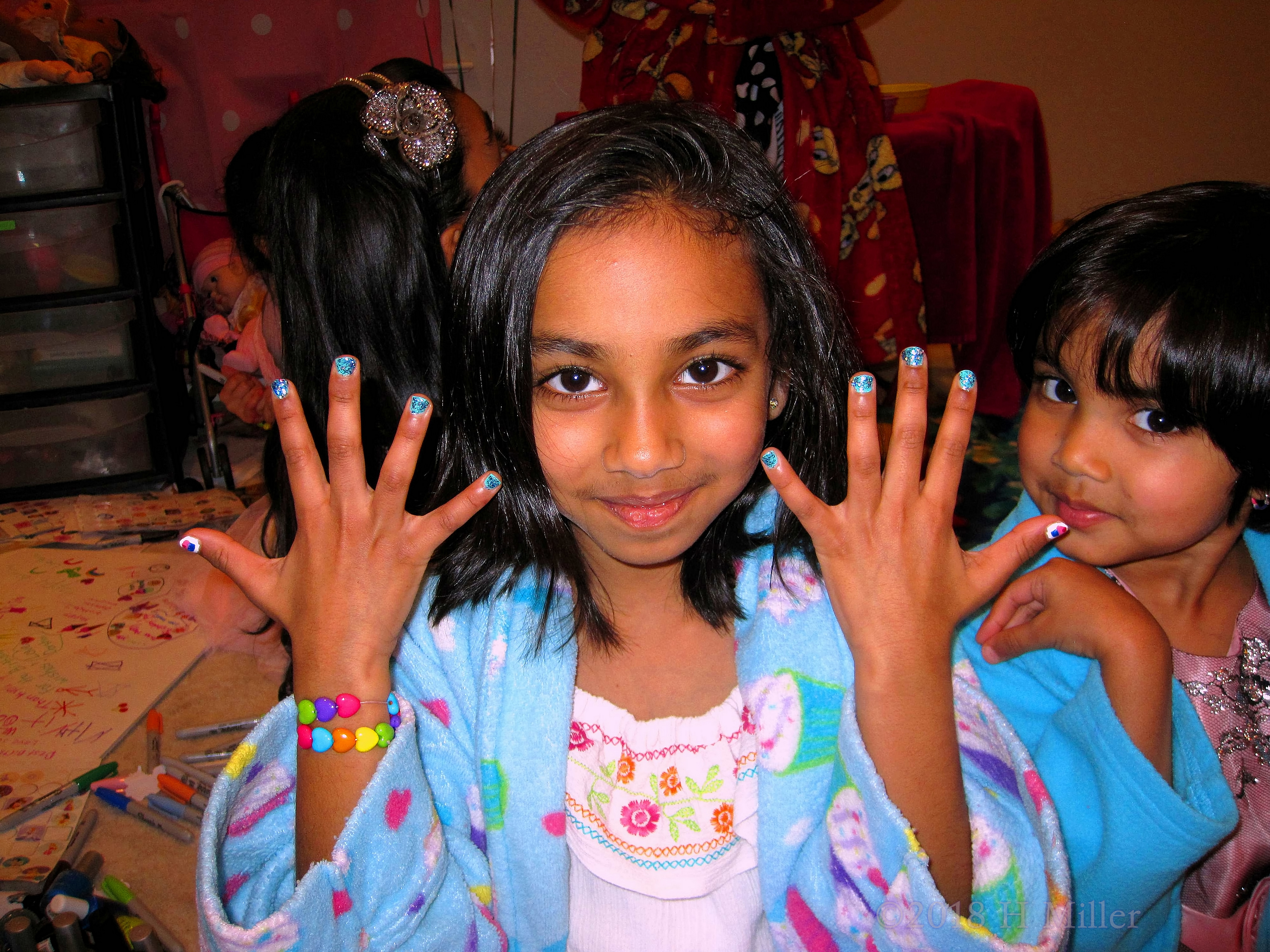 Smiling As She Shows Her Perfect Kids Mani Is Completed At The Spa For Girls. 