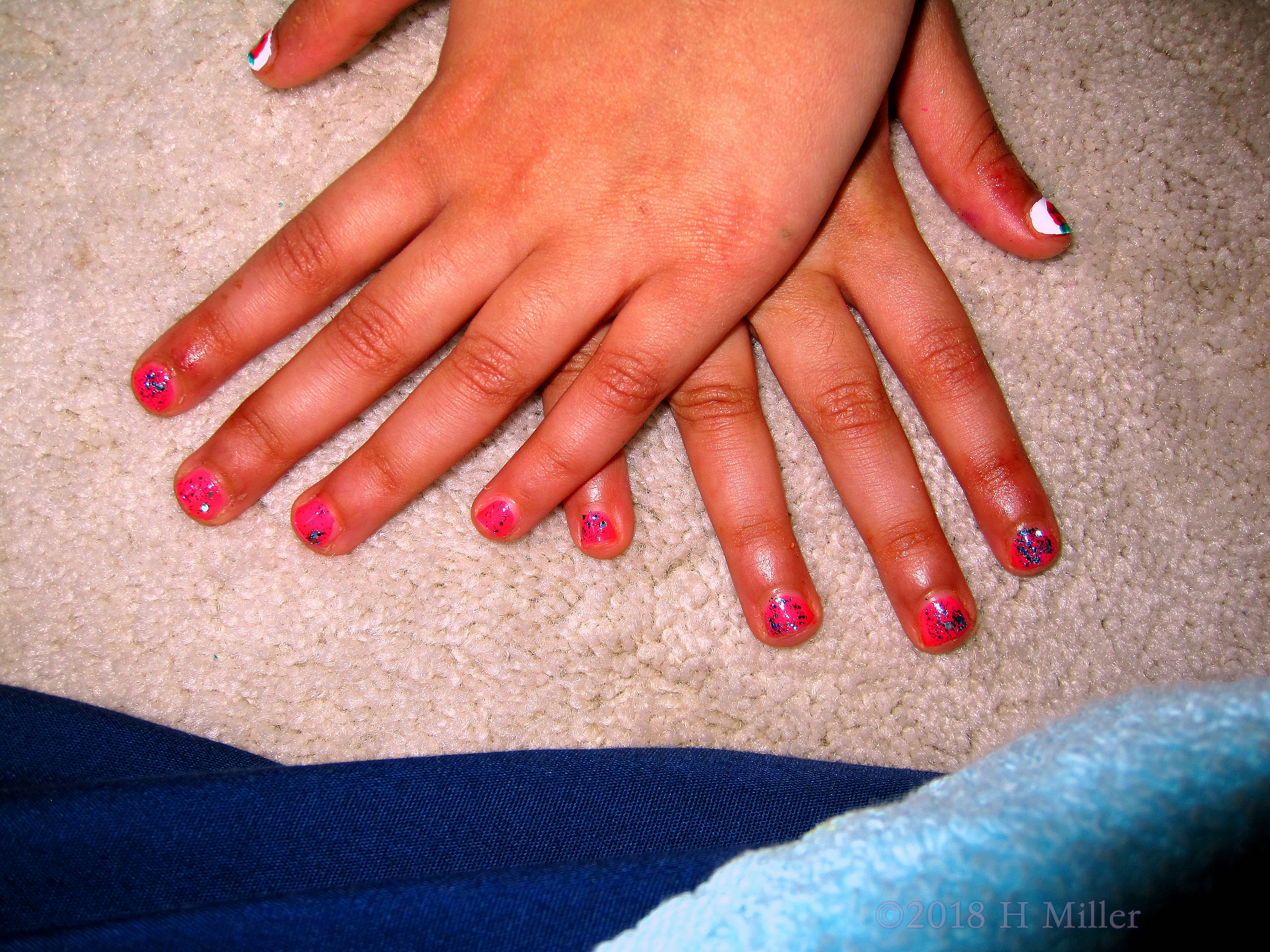 Strawberry Nail Art With Glittery Pink Nail Color. 