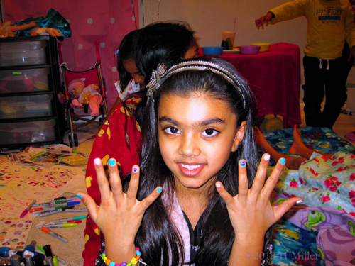 Smiling Big After Her Kids Mini Manicure!