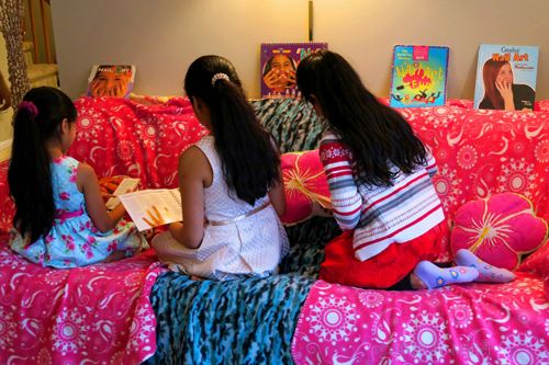 The Girls Sitting On The Couch Exploring Kids Spa Nail Art Books!