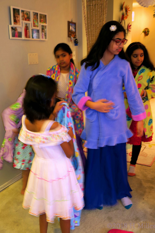 While Trying On Their Colorful Spa Robes! While Trying On Their Colorful Spa Robes!