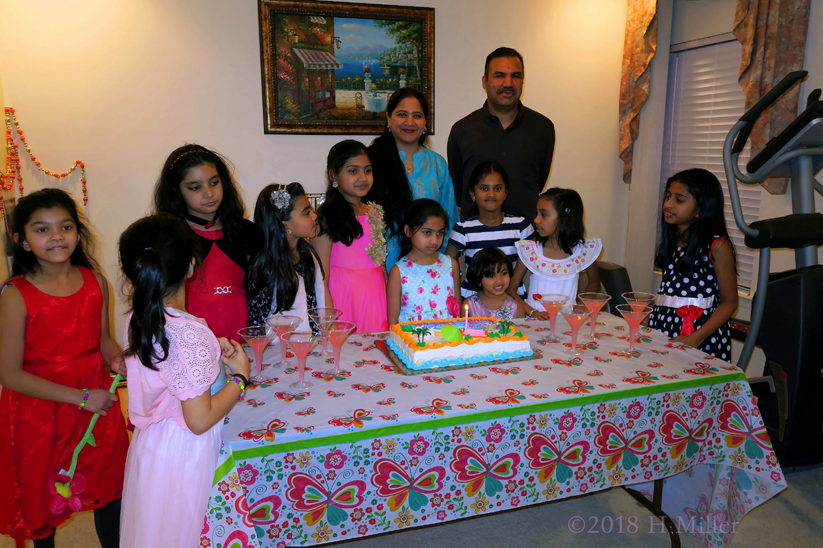 All Guests Standing Together At The Party Behind The Spa Themed Beach Birthday Cake! 