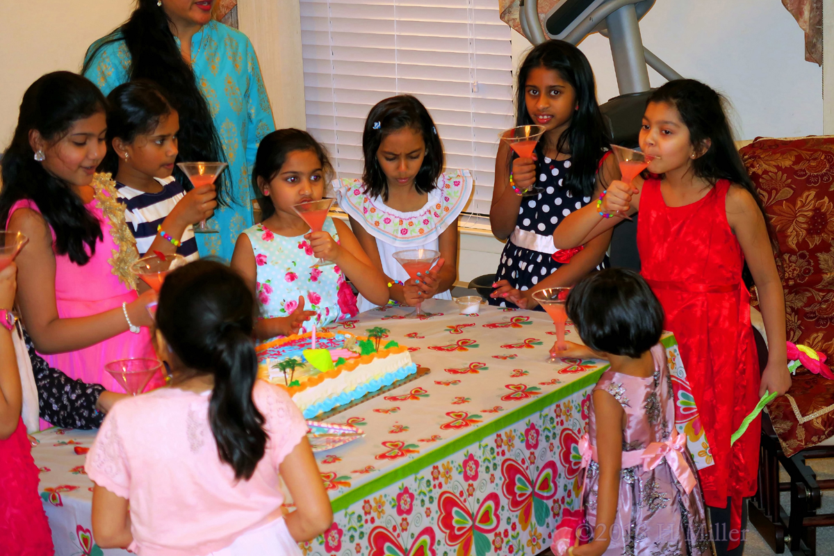 Darshini And Her Friends Taking Refreshing Sips Of Juice. 1