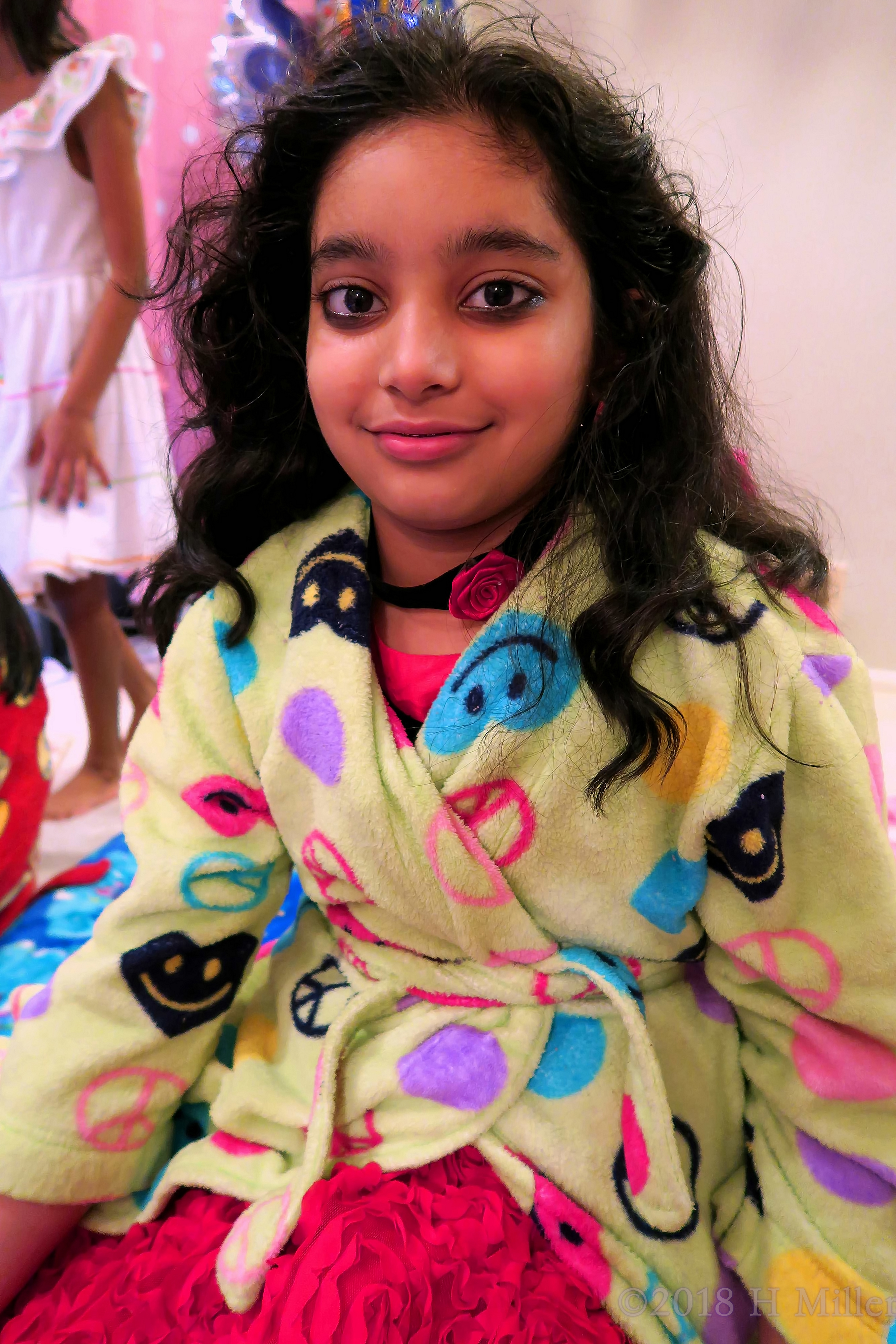 Closeup Of The Smiling Party Guest After Her Facial For Girls. 