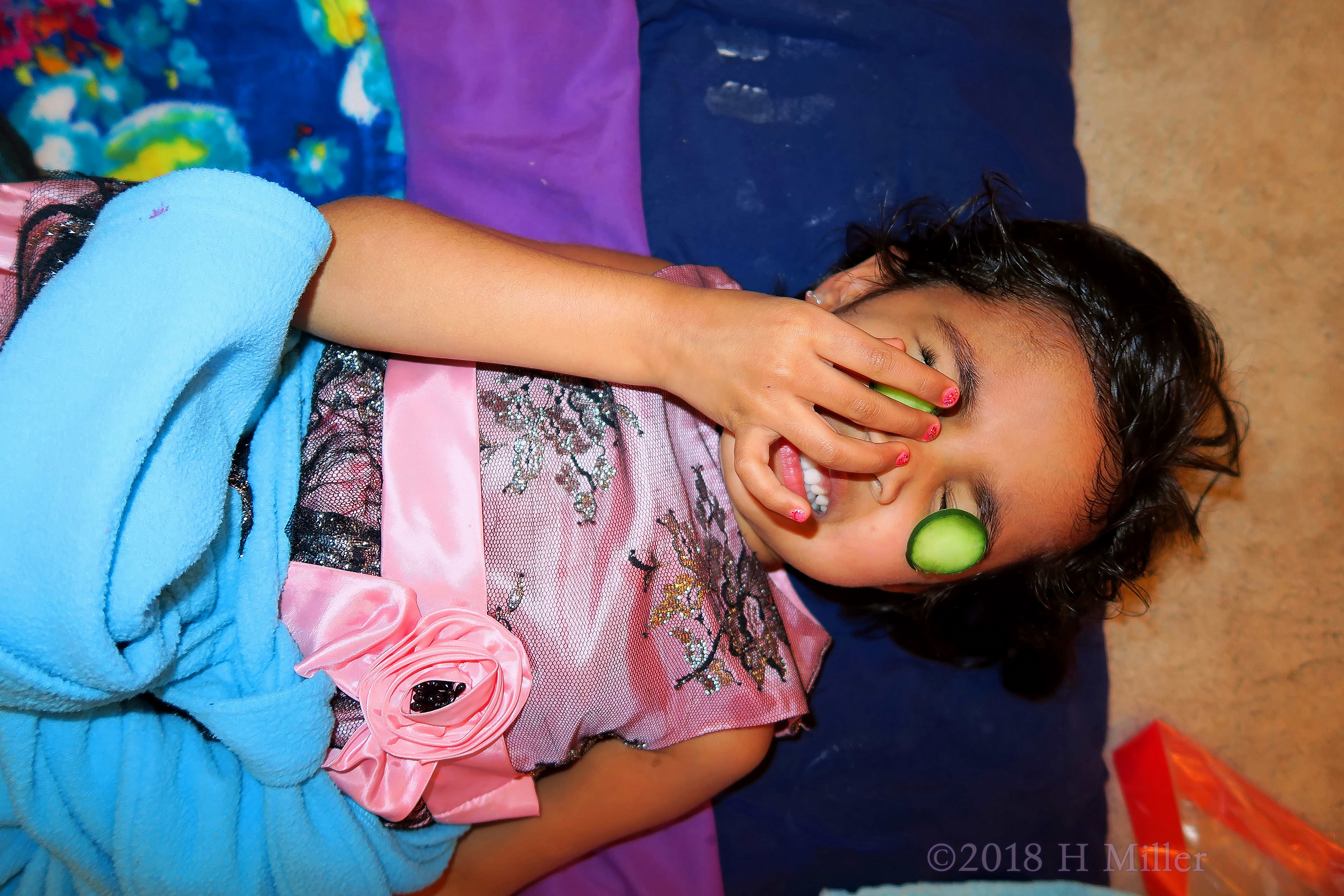 She Tries To Adjust The Falling Cuke During Her Facial For Kids. 