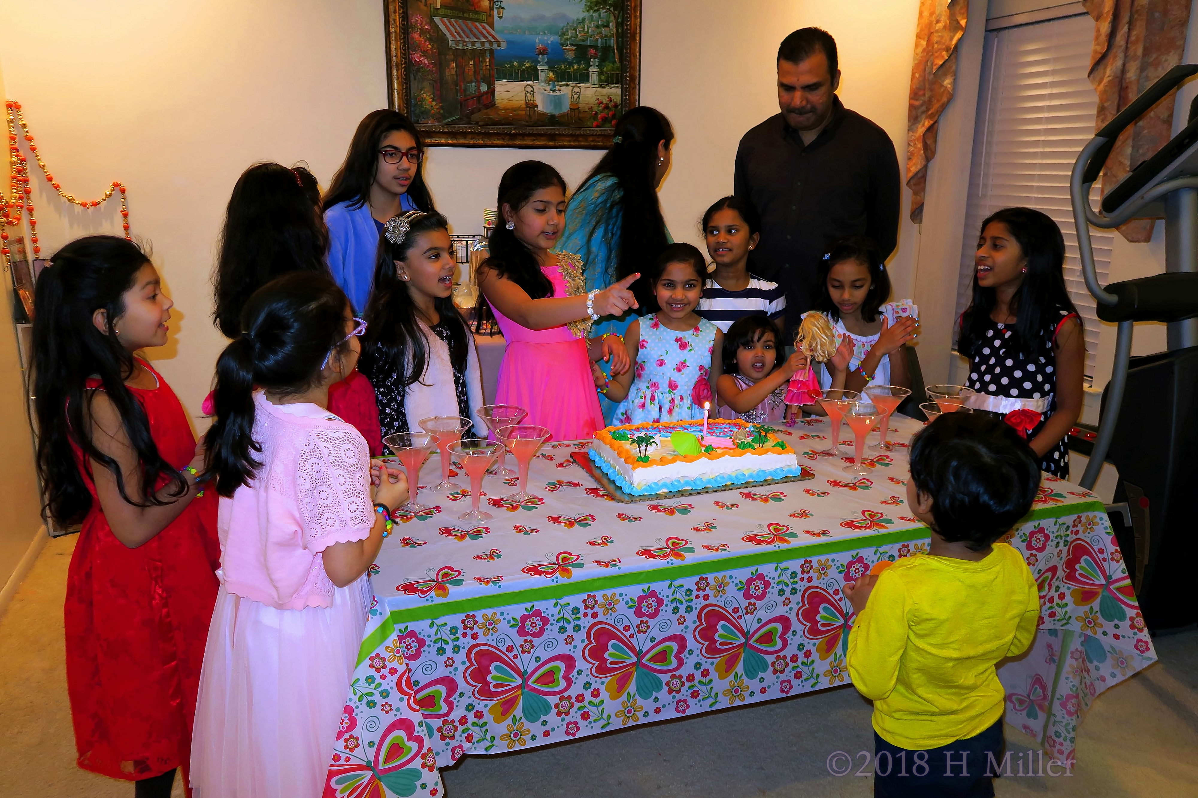 The Guests Gather Around To Convey Their Happy Birthday Wishes. 