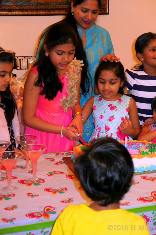 Happy While Cutting The Birthday Cake. 