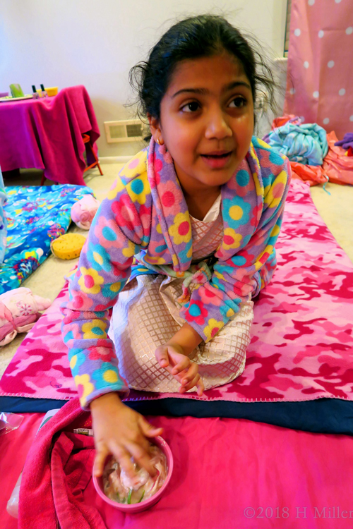 On The Facial Mat Helping To Mix The Masque Ingredients, She's All Set For Her Kids Facial. On The Facial Mat Helping To Mix The Masque Ingredients, She's All Set For Her Kids Facial.