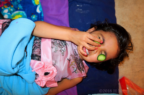 She Tries To Adjust The Falling Cuke During Her Facial For Kids.