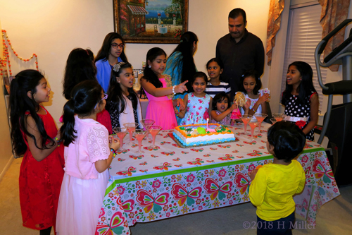 The Guests Gather Around To Convey Their Happy Birthday Wishes.