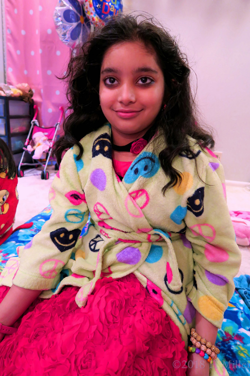 With A Cool Spa Robe On, She Enjoys The Spa Party After Her Refreshing And Relaxing Kids Facial. With A Cool Spa Robe On, She Enjoys The Spa Party After Her Refreshing And Relaxing Kids Facial.