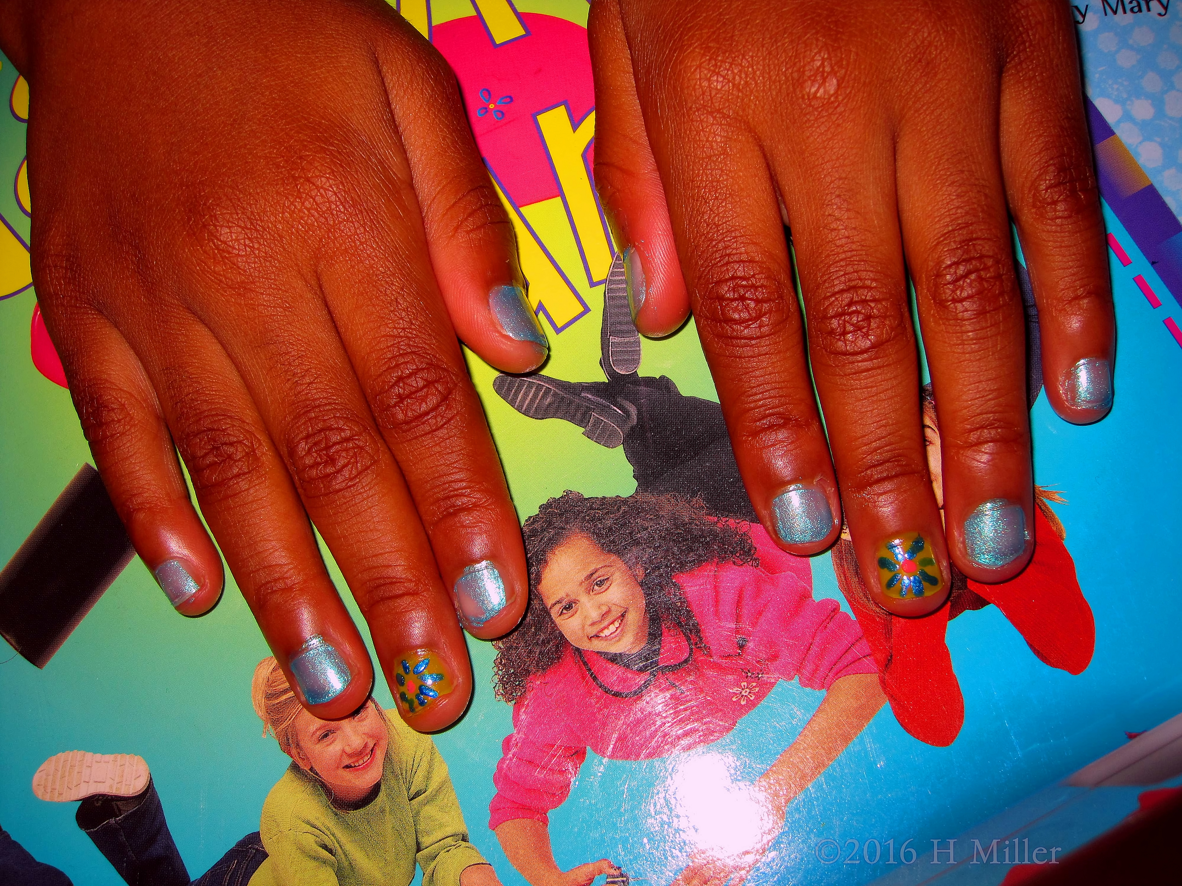 Blue Glitter And Flower Kids Manicure Blue Glitter And Flower Kids Manicure