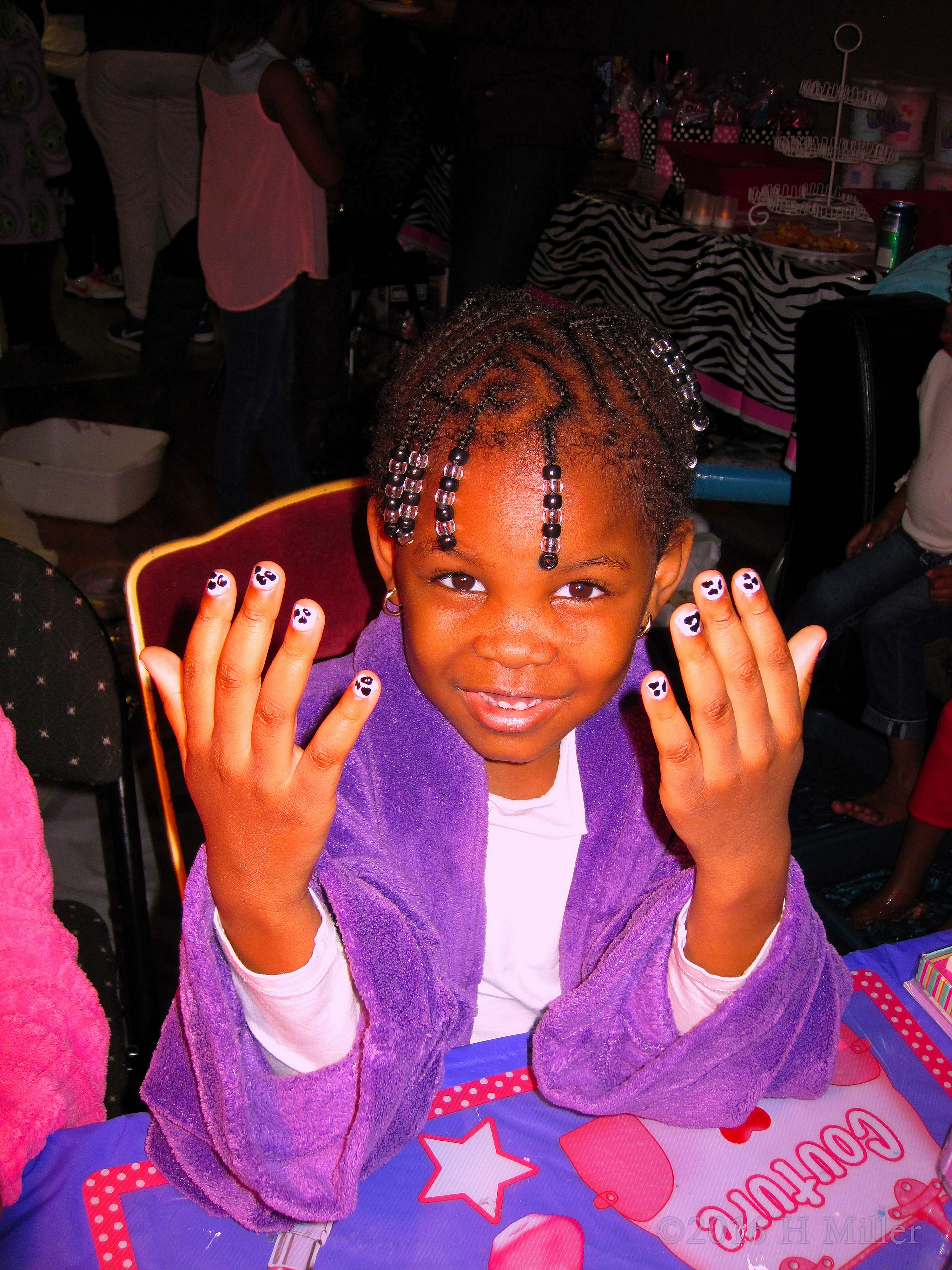 She's Loving Her Cute Dalamation Manicure She's Loving Her Cute Dalamation Manicure