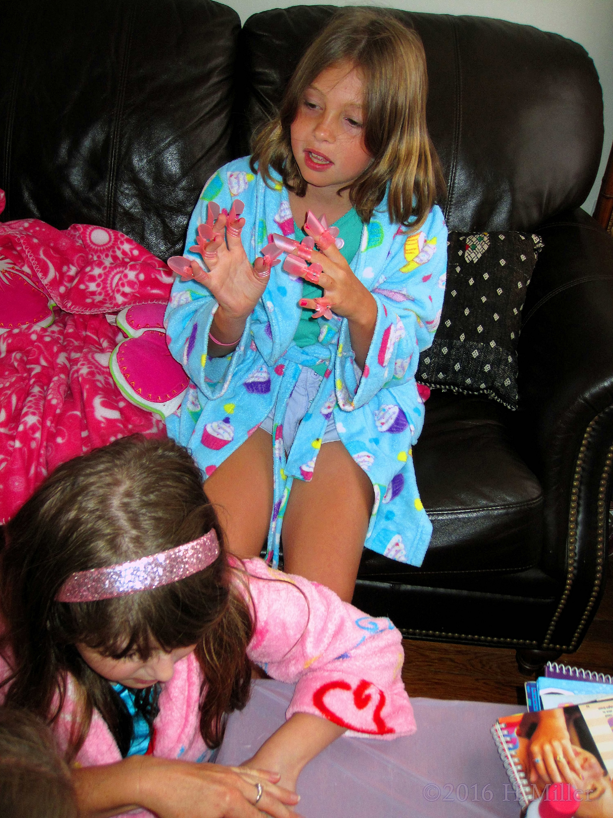 Hanging Out On The Couch With Her Manicure Protectors 