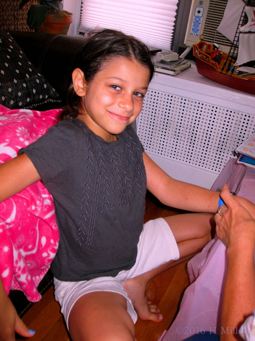 She's Having Fun Getting Her Kids Manicure Done! She's Having Fun Getting Her Kids Manicure Done!