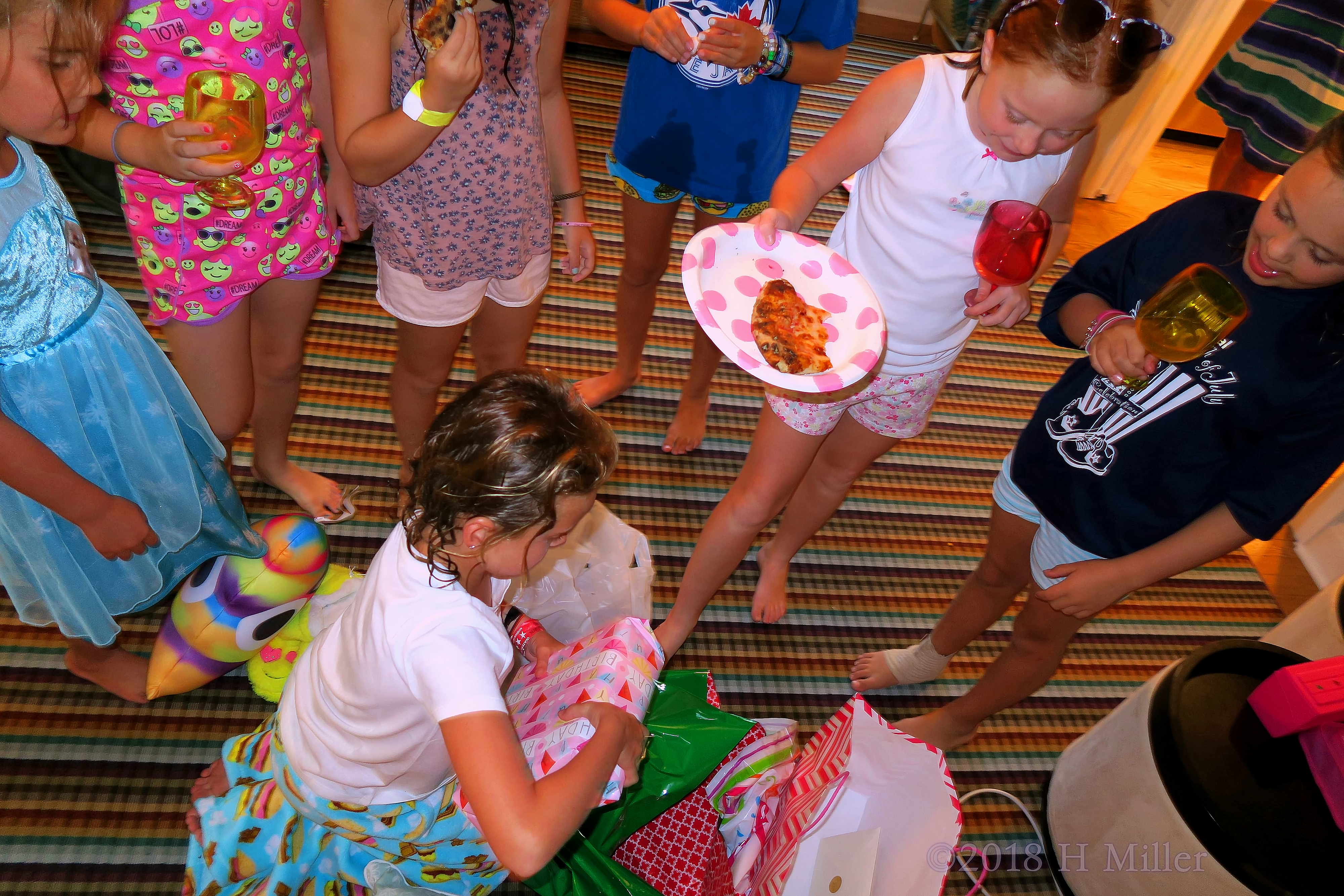 While Eliza Is Busy Unwrapping Gifts, Others Are Enjoying Pizza With Drinks! While Eliza Is Busy Unwrapping Gifts, Others Are Enjoying Pizza With Drinks!