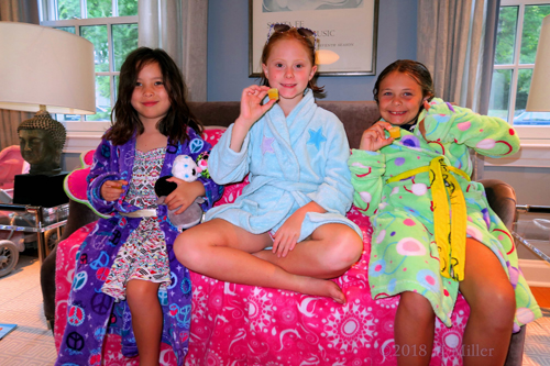 The Girls Pose On The Decorated Spa Couch. 