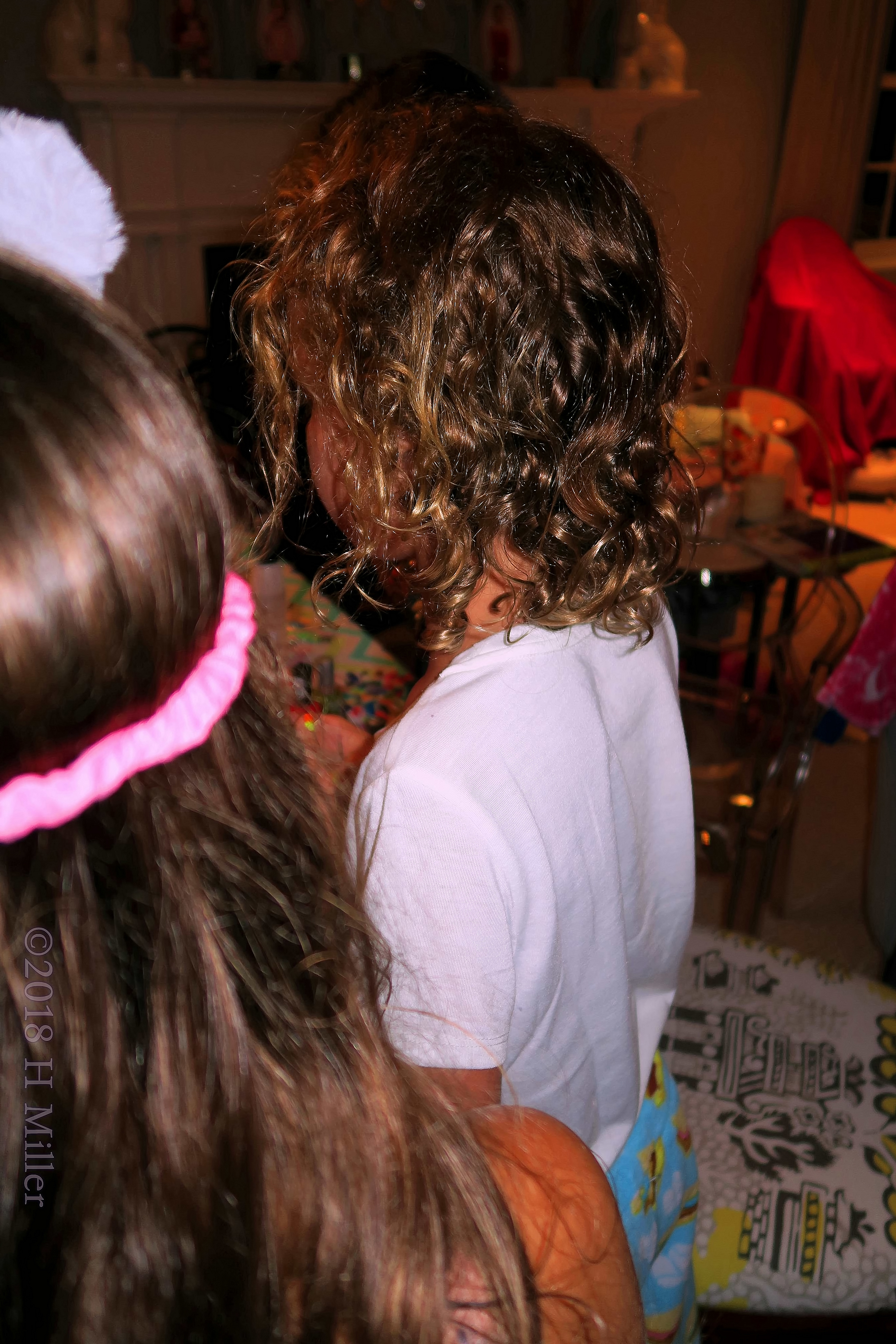 Birthday Girl Captured From Back Waiting For Her Next Activity. Birthday Girl Captured From Back Waiting For Her Next Activity.