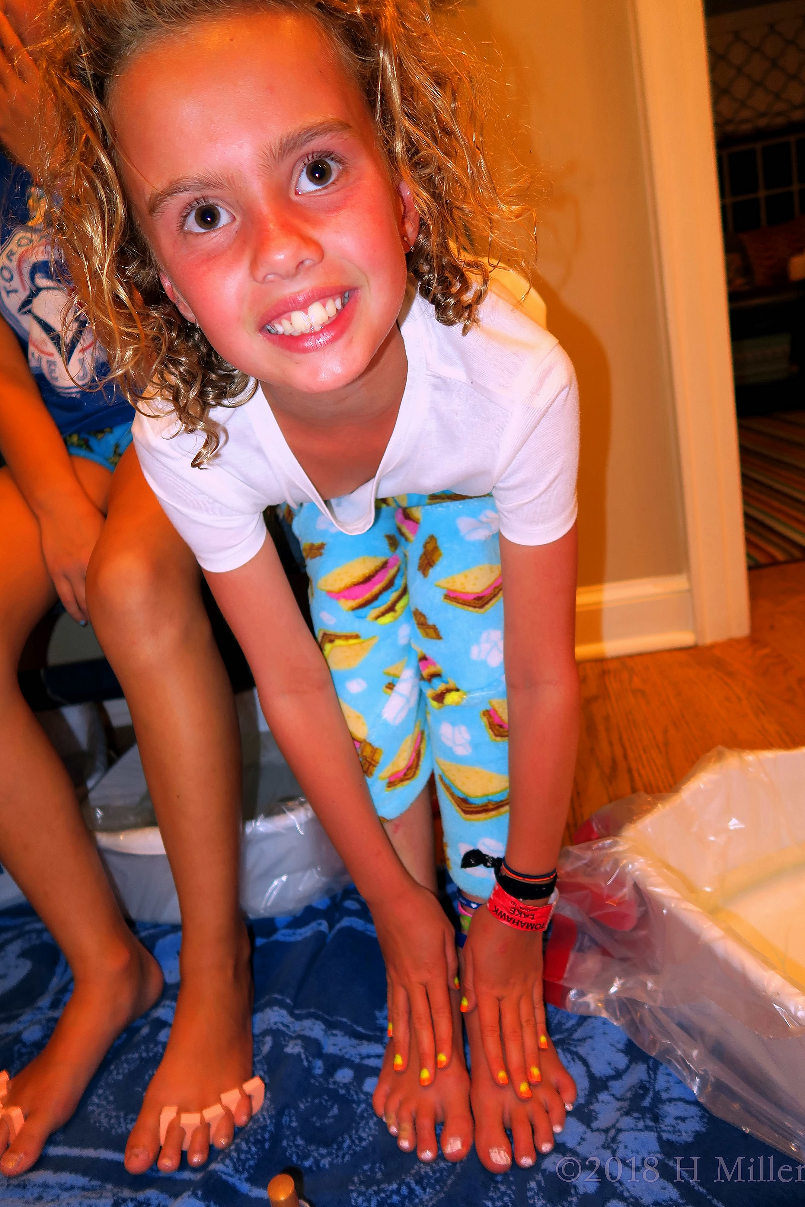 Eliza Smiles And Shows Her Kids Mani And Pedi. Eliza Smiles And Shows Her Kids Mani And Pedi.