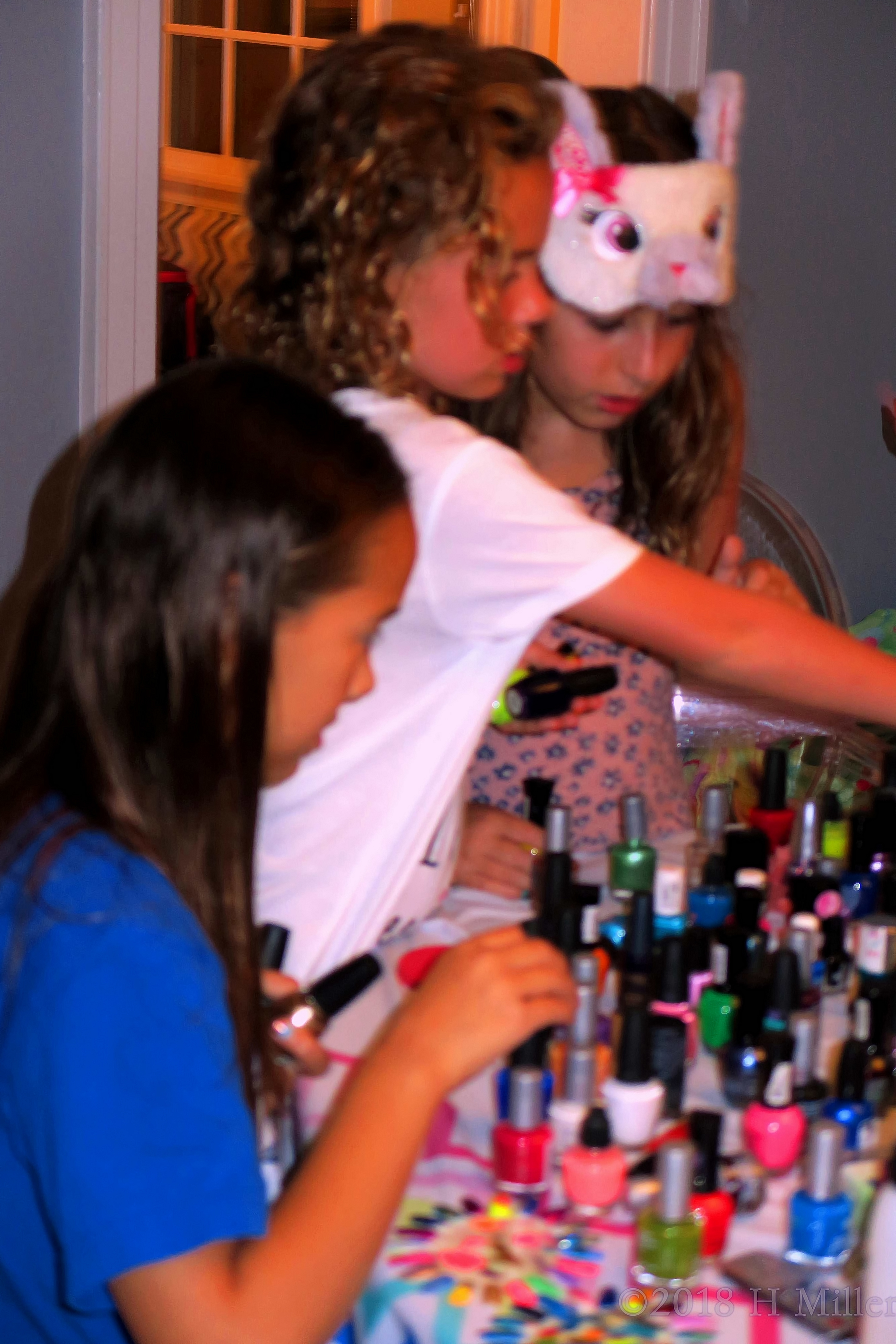 The Girls Take A Look At The Great Selection Of Nail Colors. 