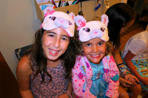 Cool Matching Masks On These Smiling Girls.