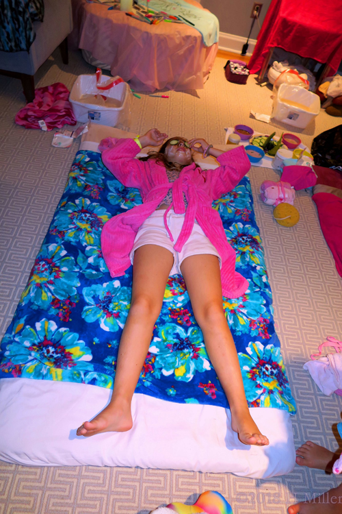 She Adjusts The Cuke Over Her Eye. She Adjusts The Cuke Over Her Eye.