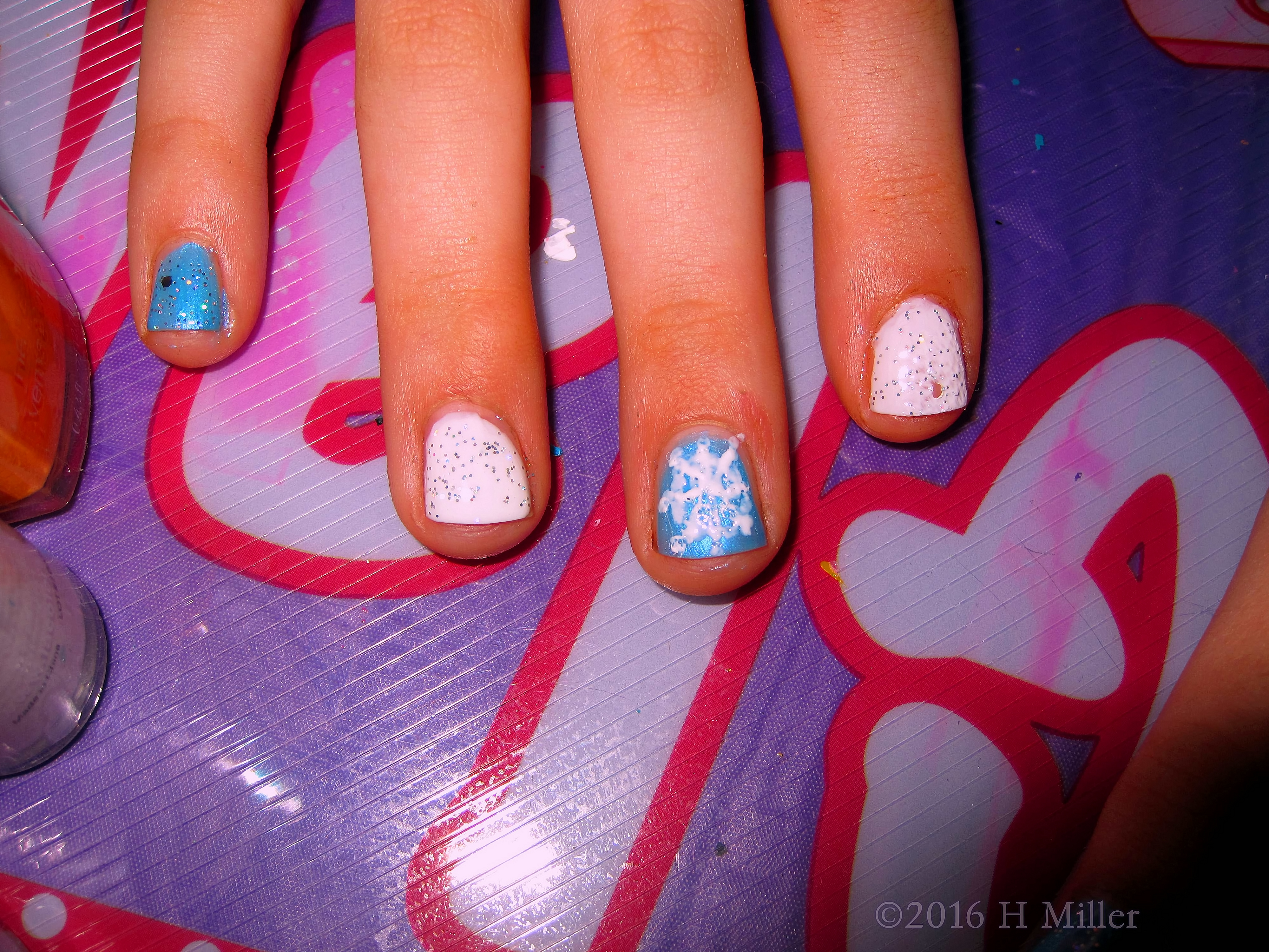 Cute Glittery Snowflake Girls Manicure Cute Glittery Snowflake Girls Manicure