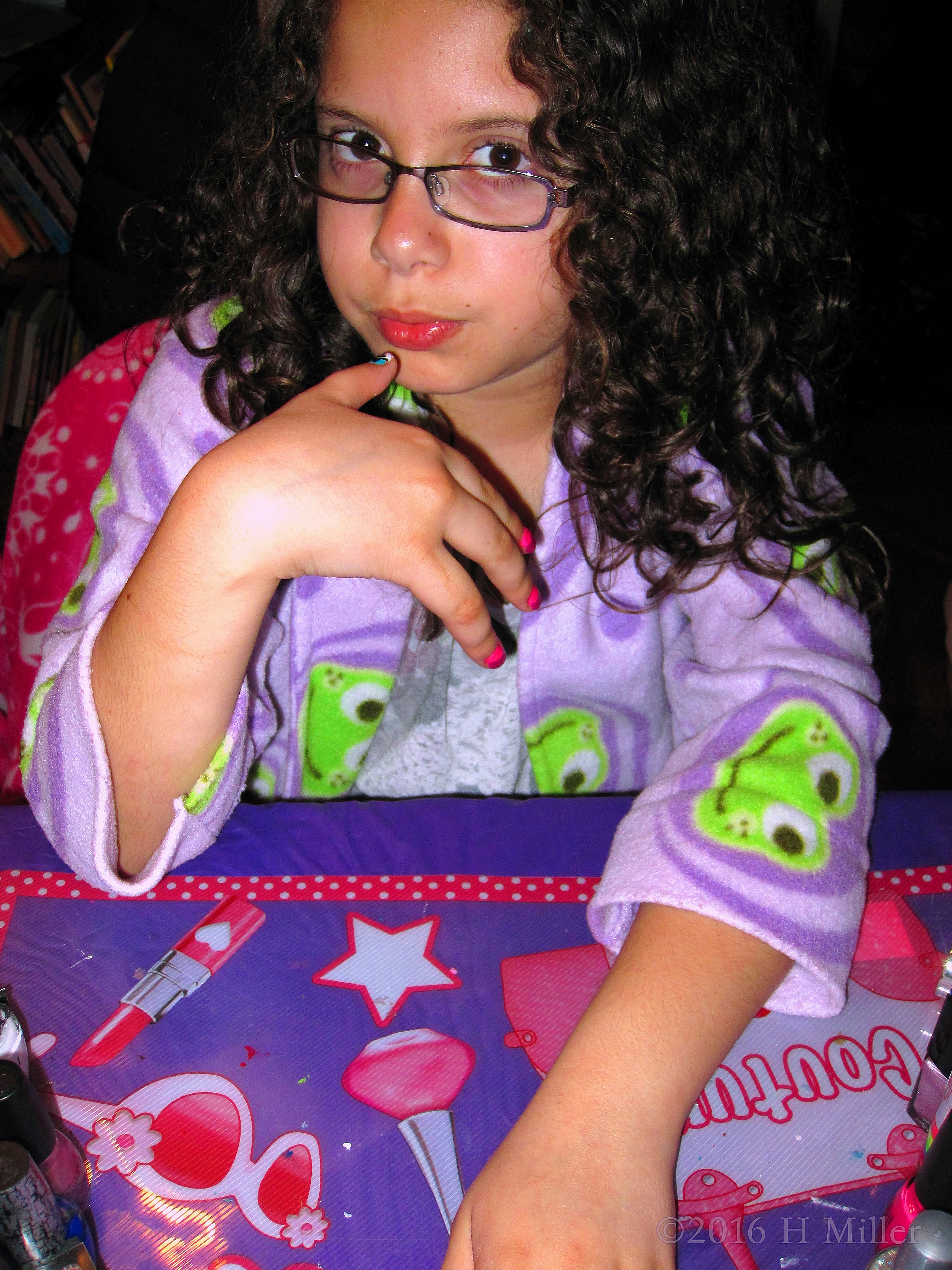 She Looks Pensive During Her Home Girls Spa Manicure. She Looks Pensive During Her Home Girls Spa Manicure.